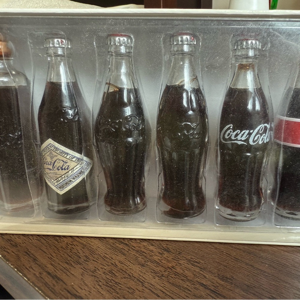 Coca-Cola Evolution of the Contour Bottle Poster